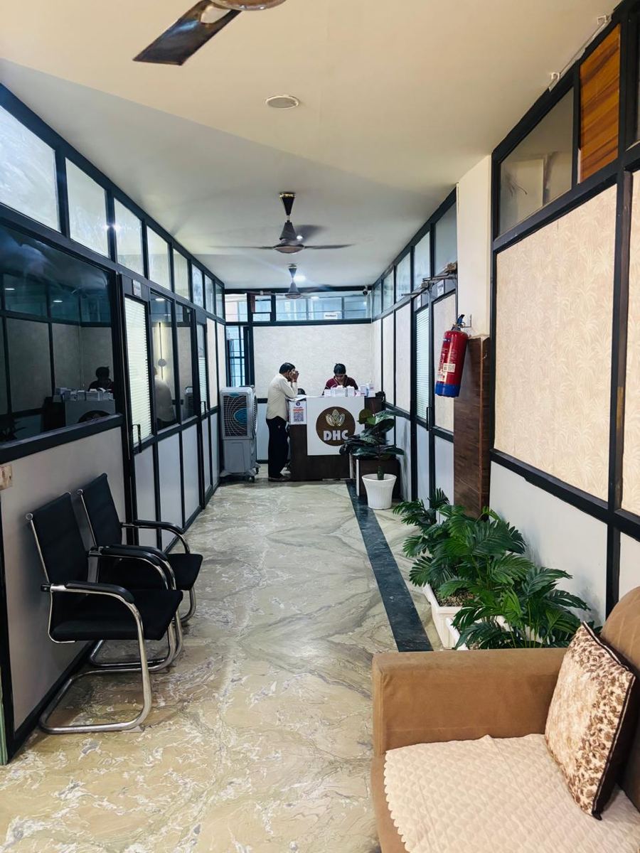 Corridor with consultation rooms and front desk